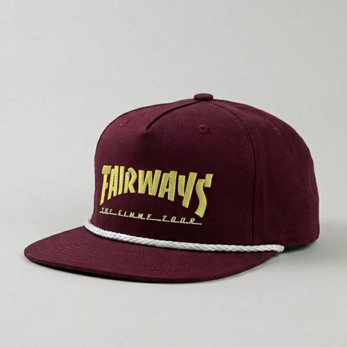 Maroon cap with yellow and white text on a light gray background