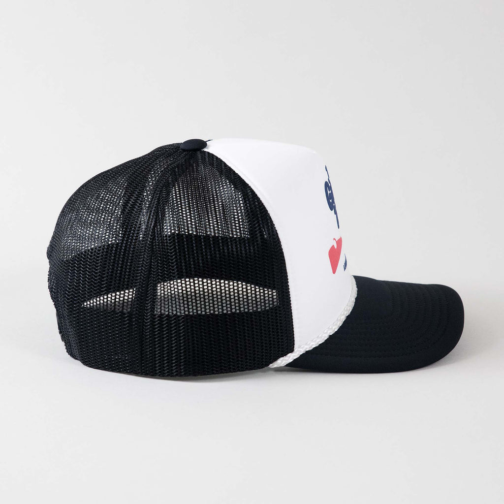 Side view of The Gimme Tour Coke-Flakes snapback trucker hat, showing side details – A Sort of Golf Company.