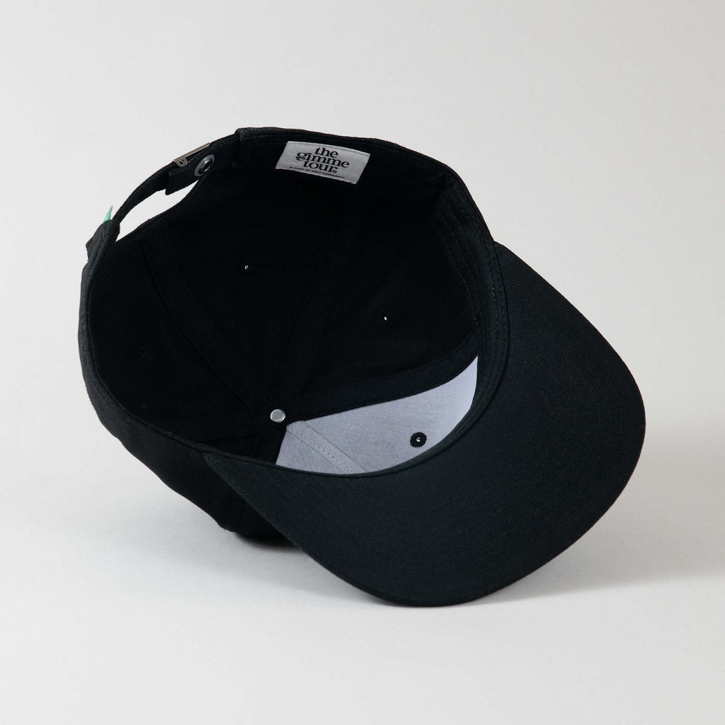 Underside view of The Gimme Tour Gimme Deadstock adjustable cap, showing inner details and branded taping – A Sort of Golf Company.