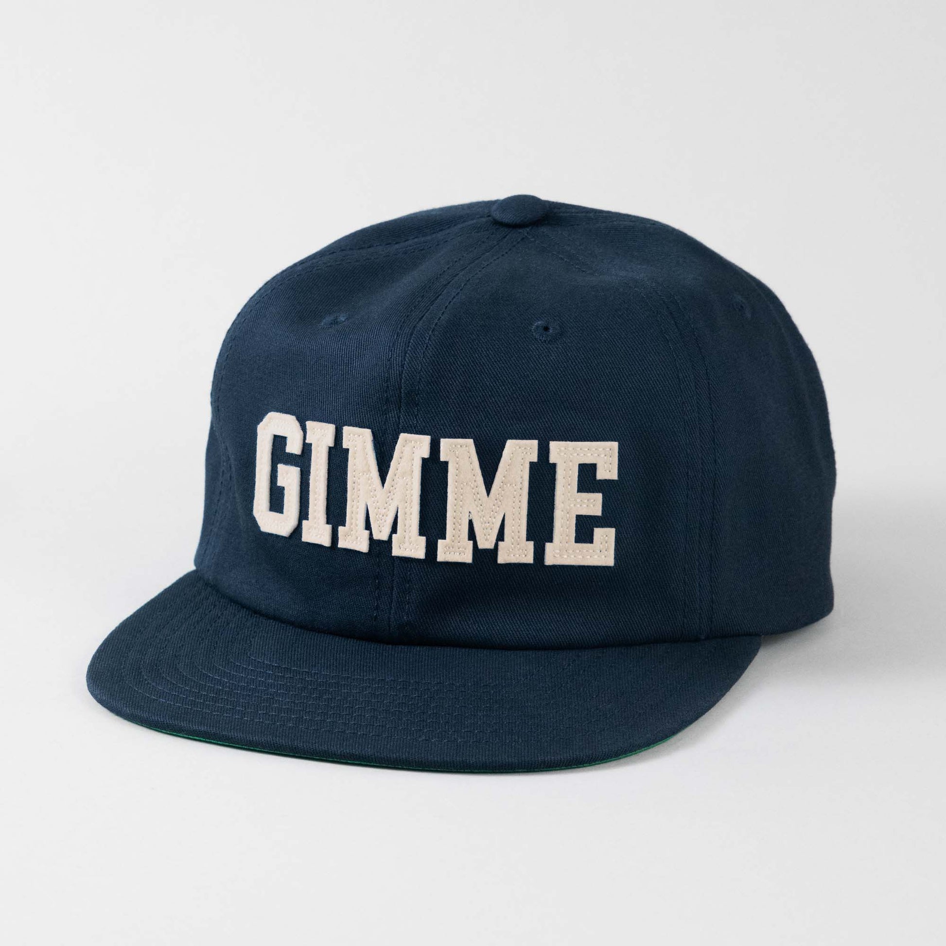 Front view of The Gimme Tour felt lettering vintage fit adjustable cap, showing front details such as letters spelling Gimme out of felt material – A Sort of Golf Company.